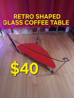 COFFEE TABLE, RETRO MODERN SHAPED GLASS TOP WITH RED UNDER SHELF CHROME LEGS