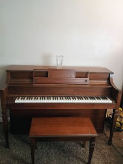 Upright Story and Clark Piano