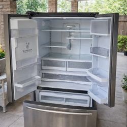 GeStainless steel French door refrigerator in great condition. Spacious interior with bottom freezer drawer. Clean, works perfectly, ready for pickup.