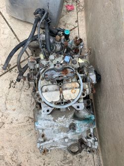 1985 Chevy intake manifold with carburetor