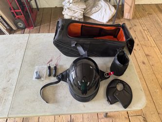 Motorcycle cargo holder with helmet