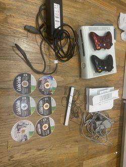 Wii console and Xbox 360 with everything