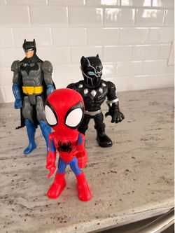 Three action figure figures
