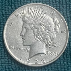 1922 One Dollar Silver - No Mint Mark. $85,000.00