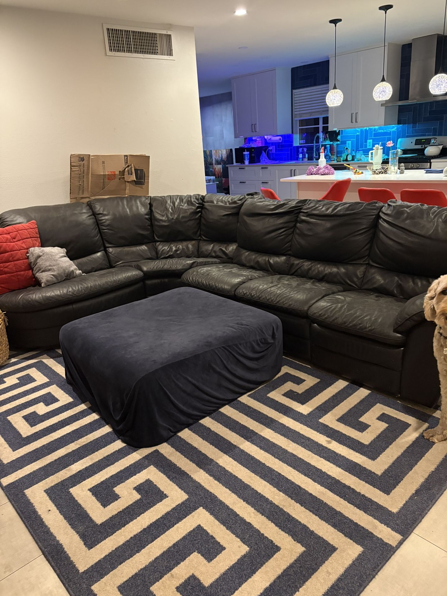 Black leather Sectional Couch With Connected Recliner