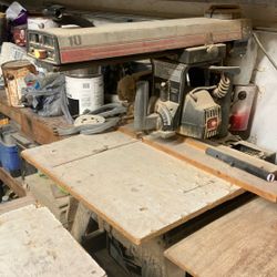 It’s a 10 inch craftsman radio arm saw cuts perfect base. Everything one piece.