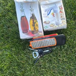 Oil And Vinegar Cruets Cheese Cutters Cookie Press And Bootle Opener Lot