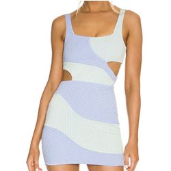 Lovers & Friends Catcha Wave Mini Dress Size XS  The Lovers & Friends Catcha Wave Mini Dress in Size XS is a stylish and trendy piece perfect for summ