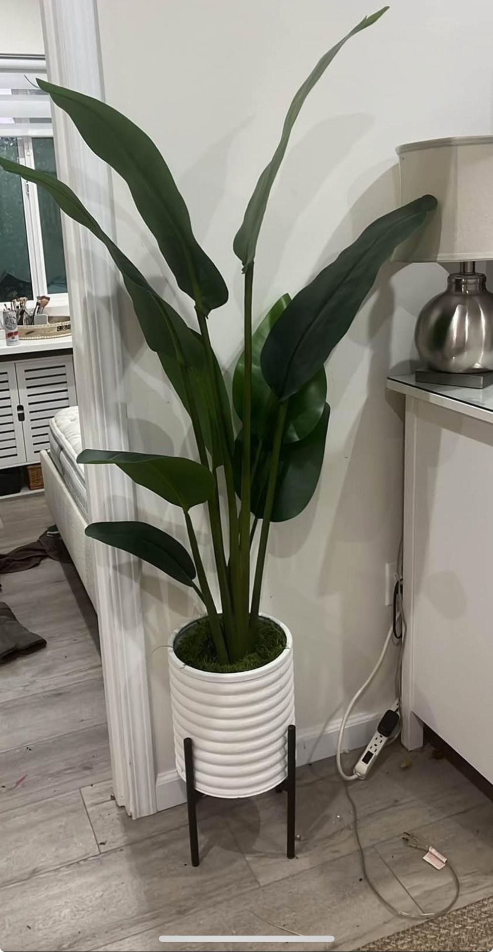 faux birds of paradise artificial plant in white ceramic pot