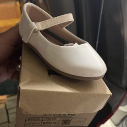 Little Girl Dressing Shoes