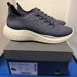 Ecco Therap dark blue leather uppers with a white Phorene midsole.