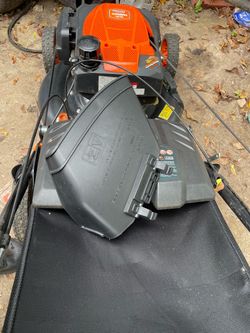 New Lawnmower with paperwork.