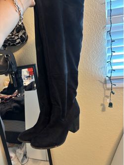 Black high knee boots