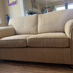 Couch- warm colors (tan, yellow, brown)