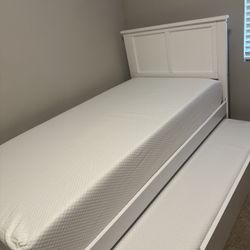 Twin size bed with trundle