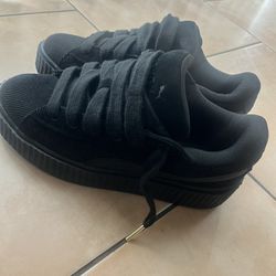 Black Fenty Pumas