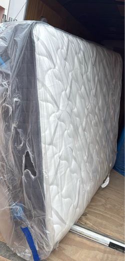 Full size mattress and box spring new in plastic