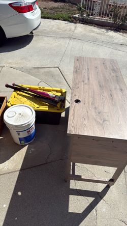 Desk, Paint Primer, Baseball bats, container