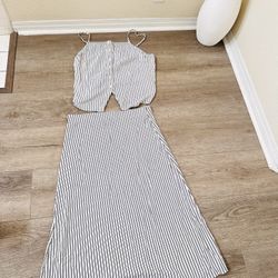 striped two-piece matching set consisting of a crop top and midi skirt.  