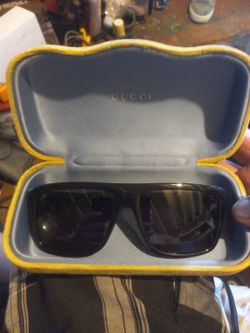 Gucci sunglasses and case $250
