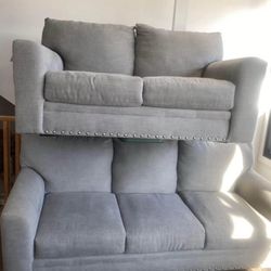 COZY GRAY FABRIC SOFA AND GLIDING LOVESEAT