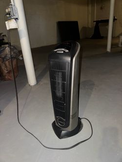 Lasko 23” Ceramic Tower Space Heater, Black and Silver
