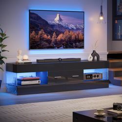 Bestier Black TV Stand for 55/60/65 Inch TV, High Gloss Modern TV Stand with Stone-Patterned Side Panels, LED Entertainment Center with Large Drawer, 