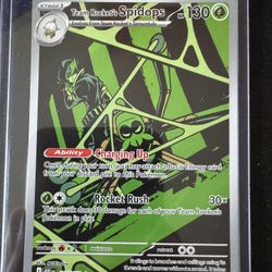 Team Rocket’s Spidops Pokemon Card - DRI 187/182