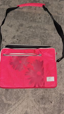 Pink laptop with strap