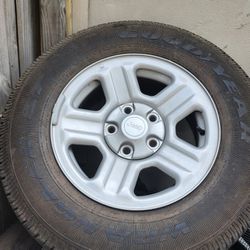 4 Tires And 5 Rims Good Year I. Good Condition 