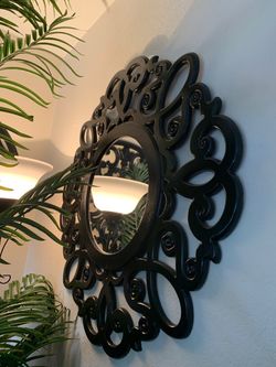Intricate framed mirror