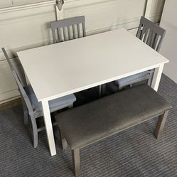 LIKE NEW 5-PC MINIMALIST LIGHT WEIGHT DINING SET (TABLE 3 CHAIRS WITH FABRIC PADS AND ONE PADDED BENCH)
