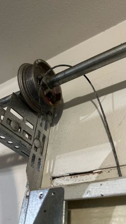 Garage Door Broken Spring Opener Off Track Replace Adjustment And Parts