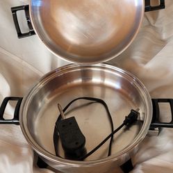 This is a Regal Ware Kitchen Nutrition electric oil core skillet, model K7271