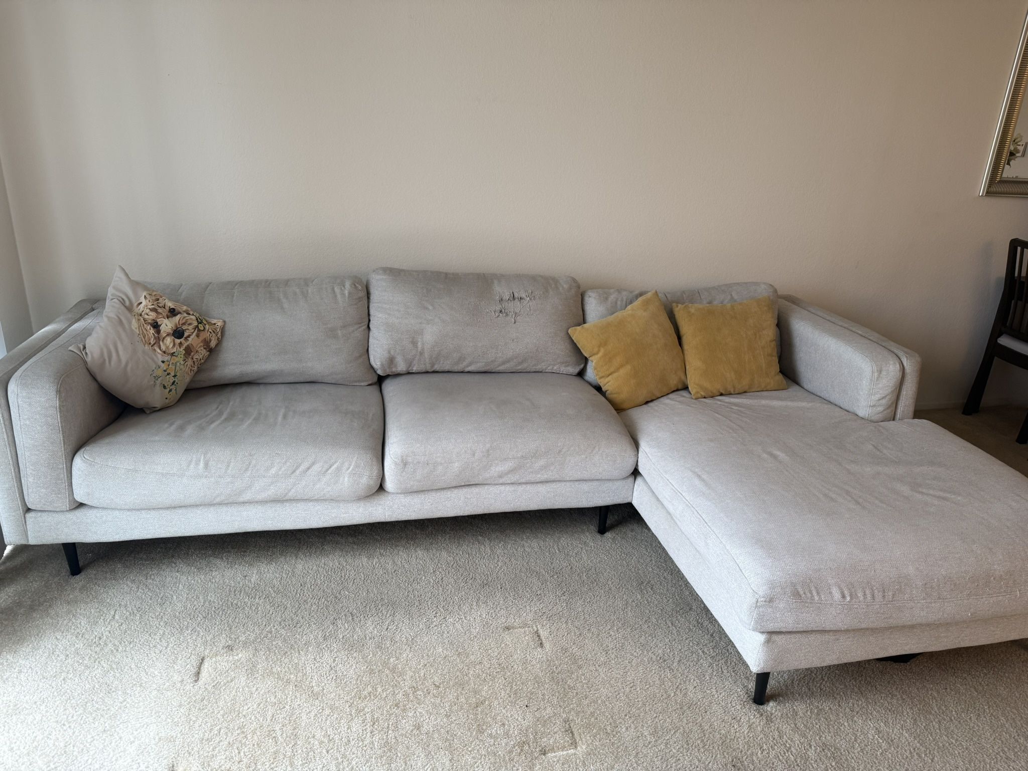 Grey couch - Living spaces 