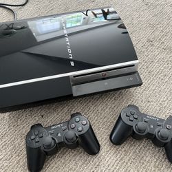PlayStation 3 With Controllers And Games