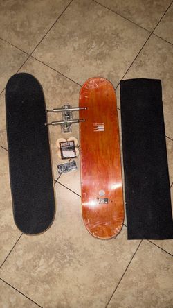 Skate board decks, grip tape, bearings, bones wheels, and trucks.