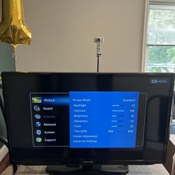 Samsung TV with HDMI and Audio Inputs.