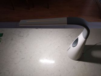 Desk lamp with built in fan
