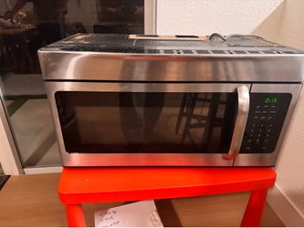 Frigidaire microwave over the range black and stainless steel