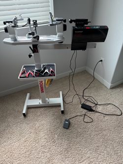 Tennis stringing machine