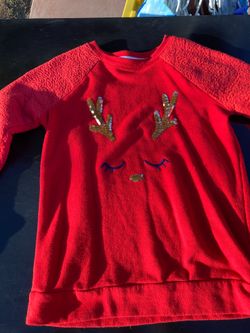 Red reindeer holiday sweater
