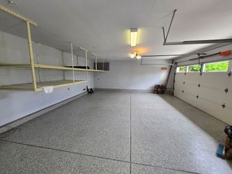 Garage tuff racks overhead shelving system