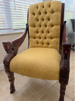 Carved angel chair