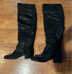 Above knee length boots