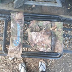 camouflage-patterned hunting chair or stool made by Ameristep