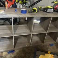 Grey Sturdy wooden storage shelf with 8 compartments.