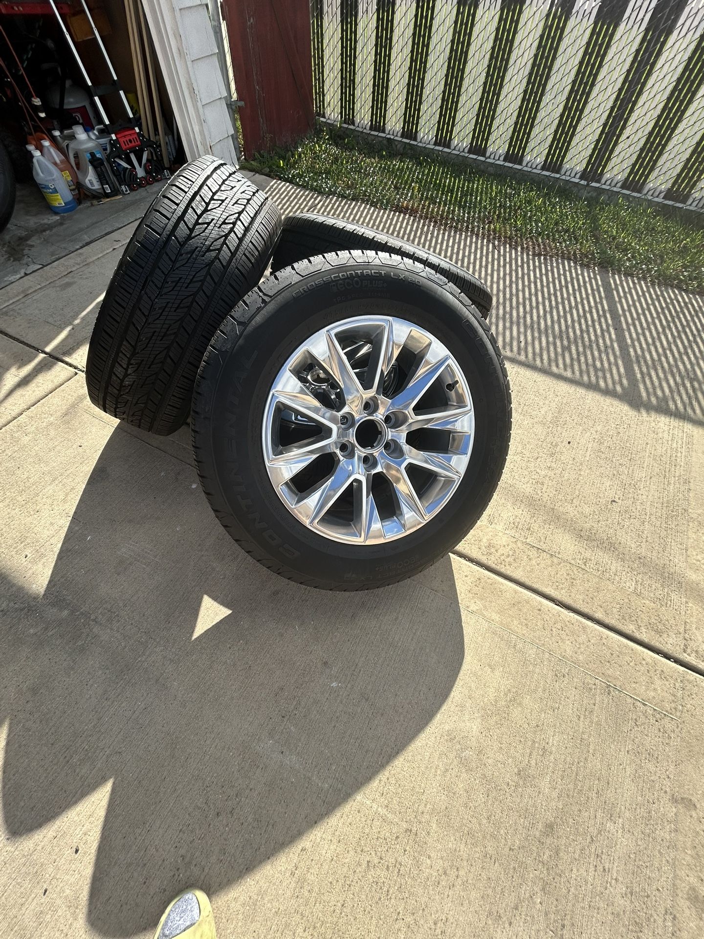 275/60R20 115T Chevy Chrome Wheels with Continental CrossContact LX20 Tires