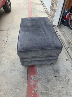 Grey ottoman built in  storage