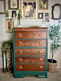 Art deco waterfall circa 1930’s redone in peacock blue, walnut, and gold hardware.